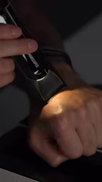 Hold the travel lock button to lock the device