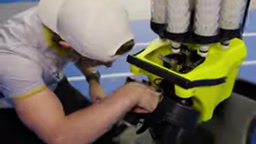 The machine orients the shuttlecock correctly before releasing it